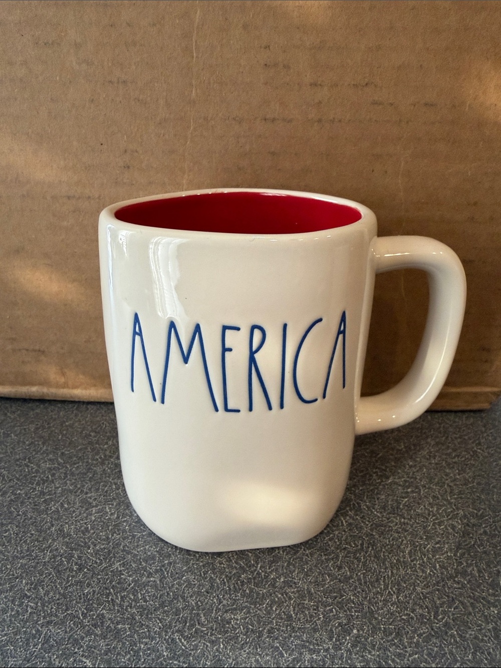Rae Dunn White Mug with Blue AMERICA Lettering and Red Interior